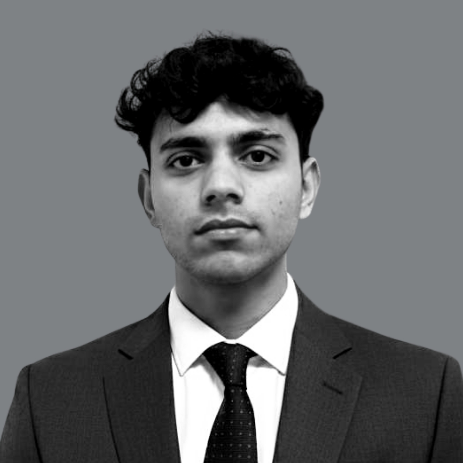 Kapil's image for the team's page against a grey background