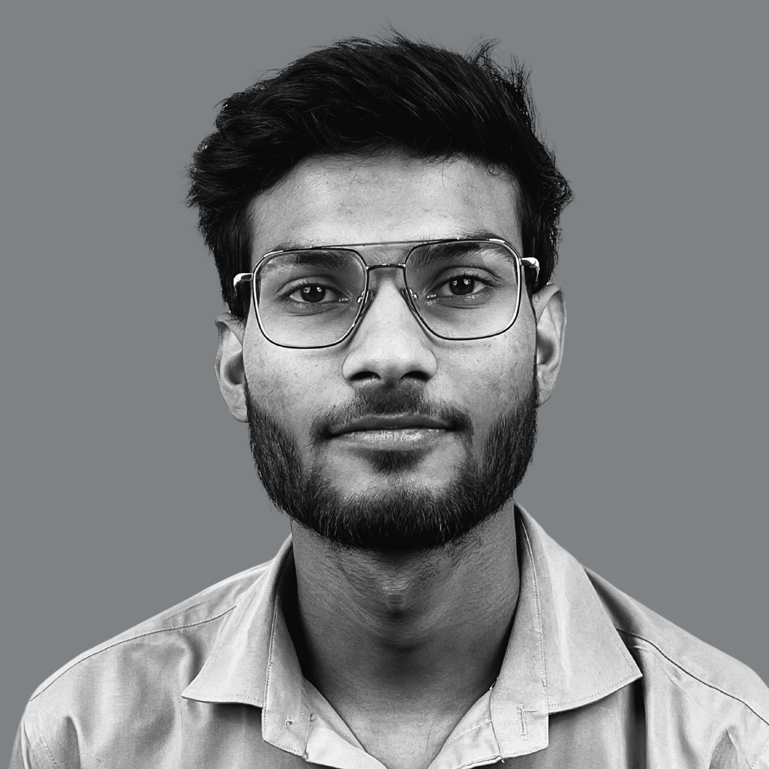 Akshat's image for the team's page against a grey background
