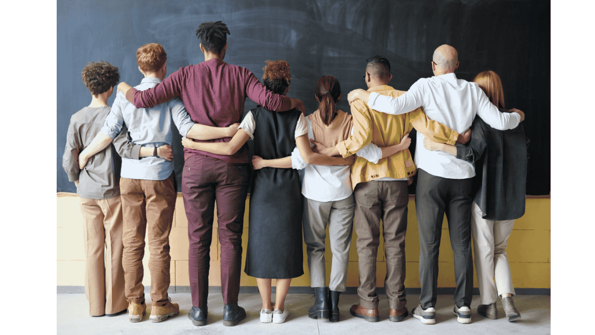 Back view of individuals standing before a board, showcasing difference in cannabis effects on men and women