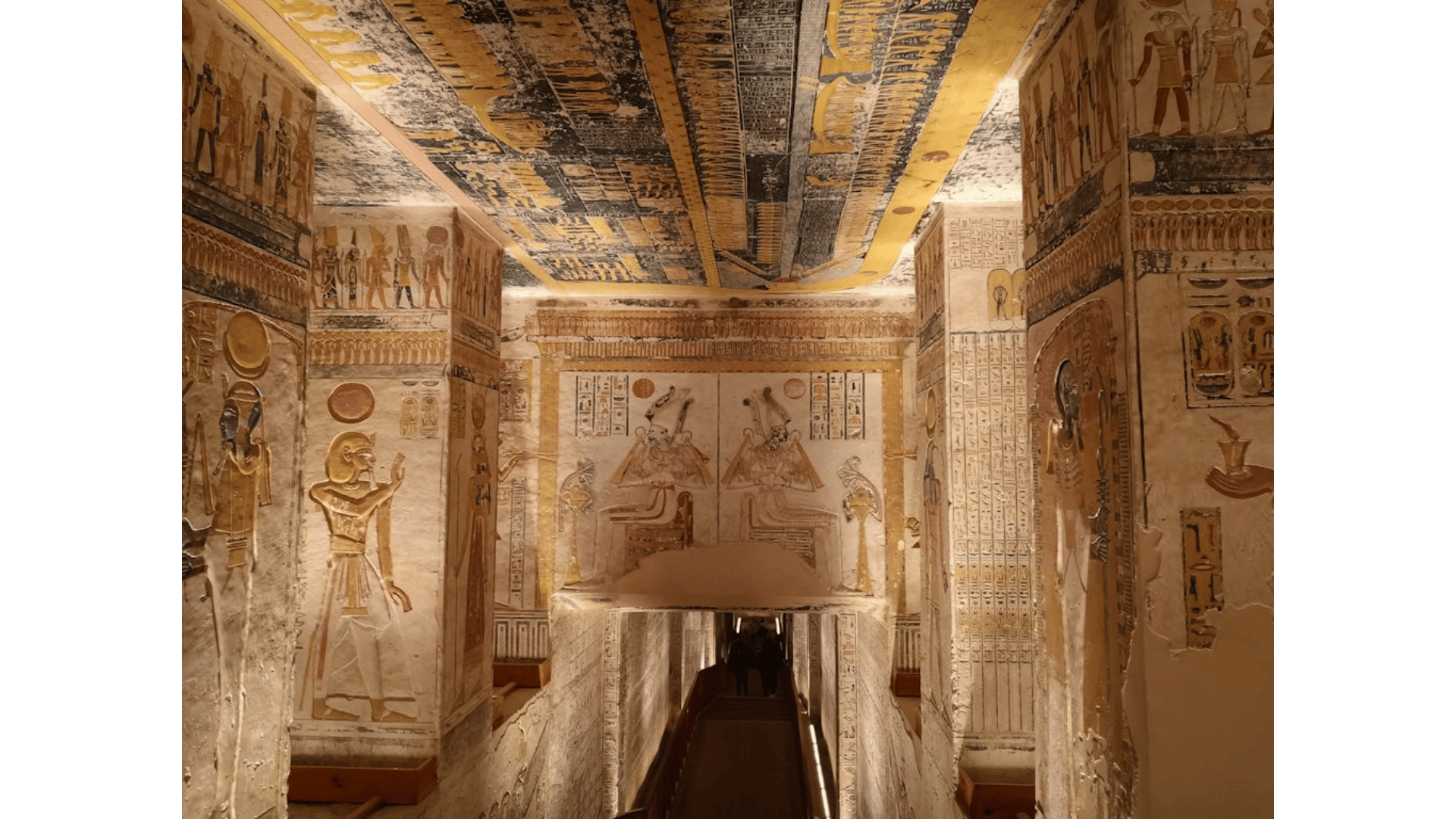 The interior image of an Egyptian temple showcases ornate columns, hieroglyphs, and ancient stone walls